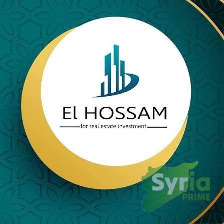 شعار مكتب الحسام العقاري